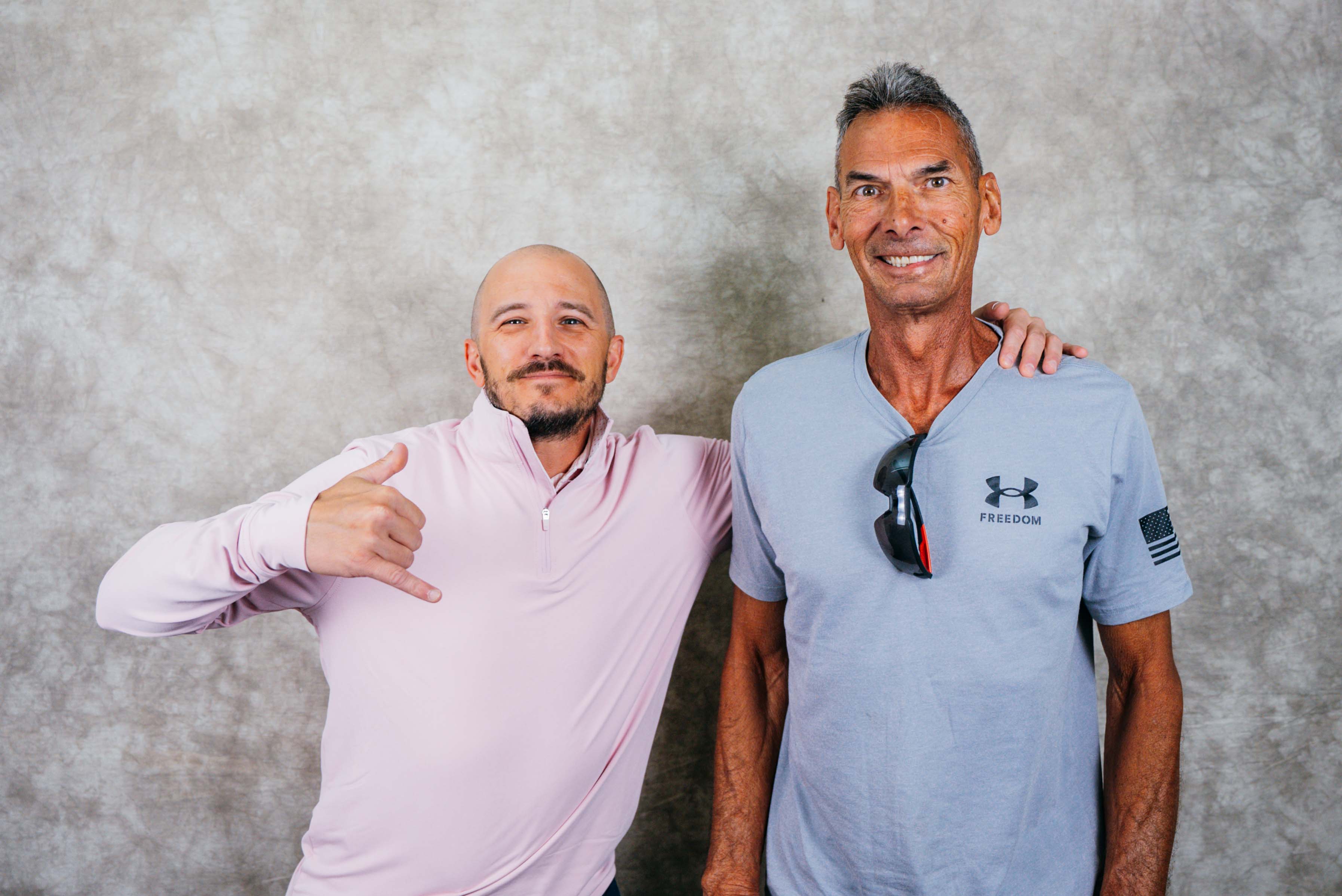 Two men posing together
